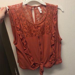 Orange, tied crop top with lace